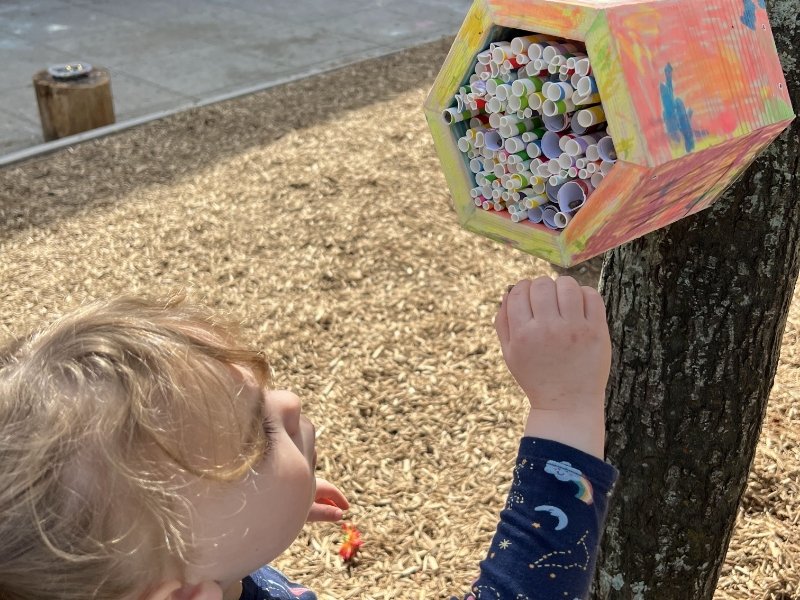preschool student building an outdoor project