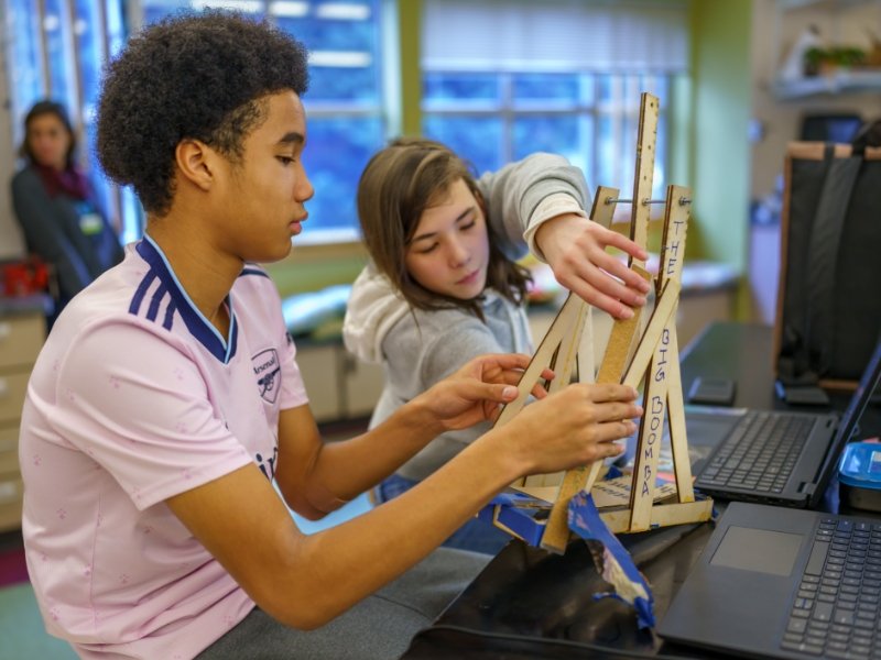Two students buiding a project in the BIG Lab makerspace